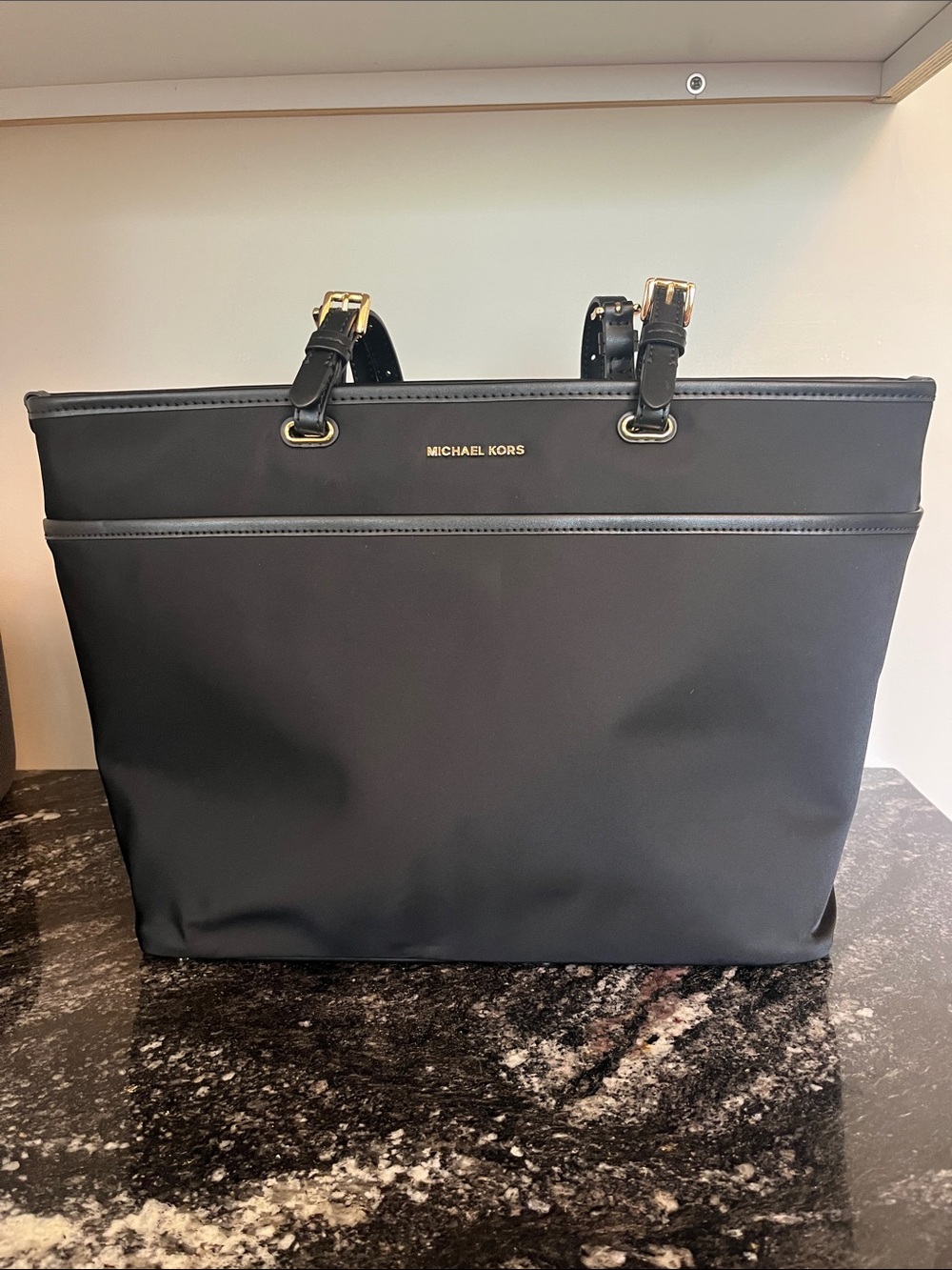 Michael Kors Black Tote with Gold Accents